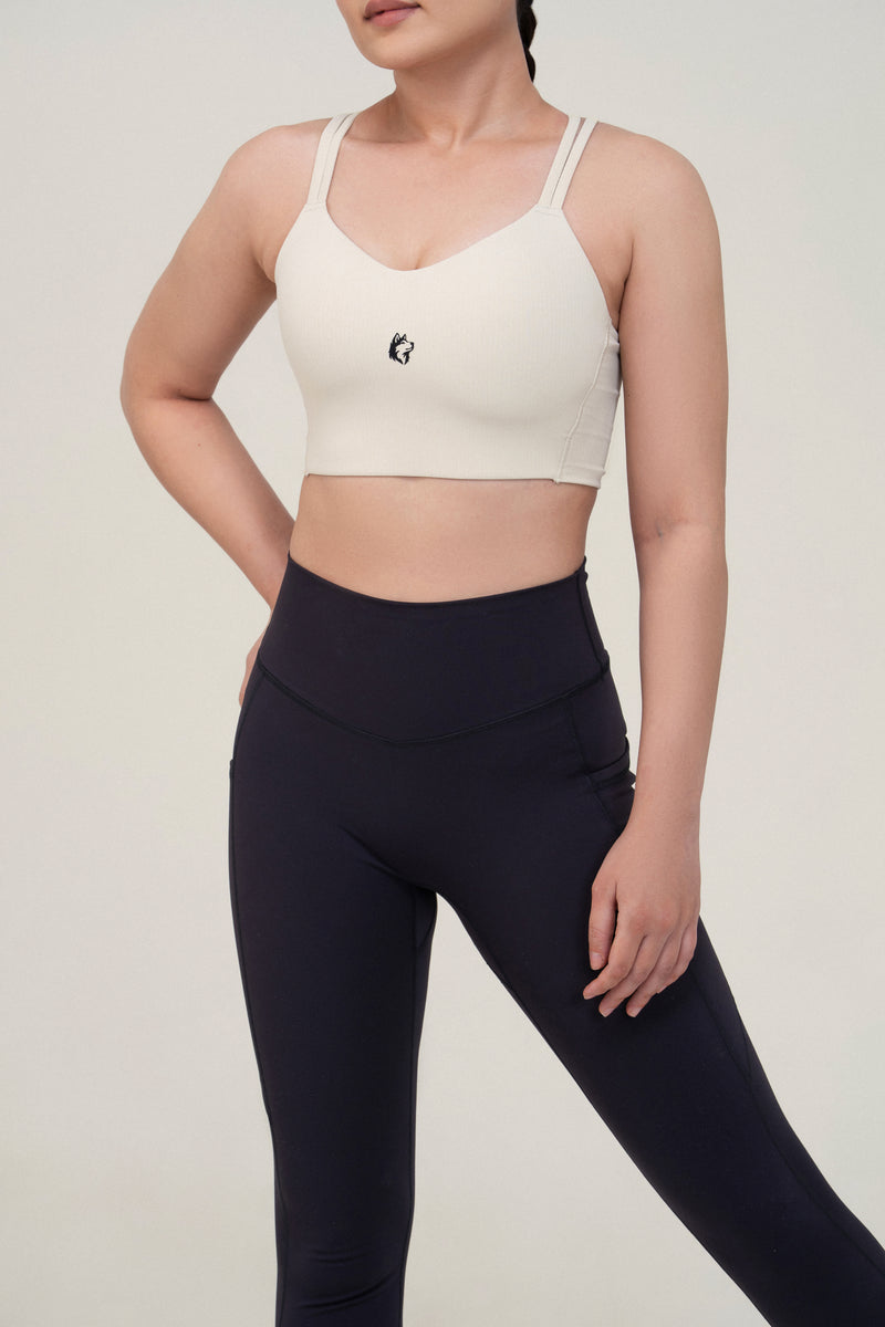 Red Husky Cross Strap Sculpt Sports Bra — Ivory White — detail — studio