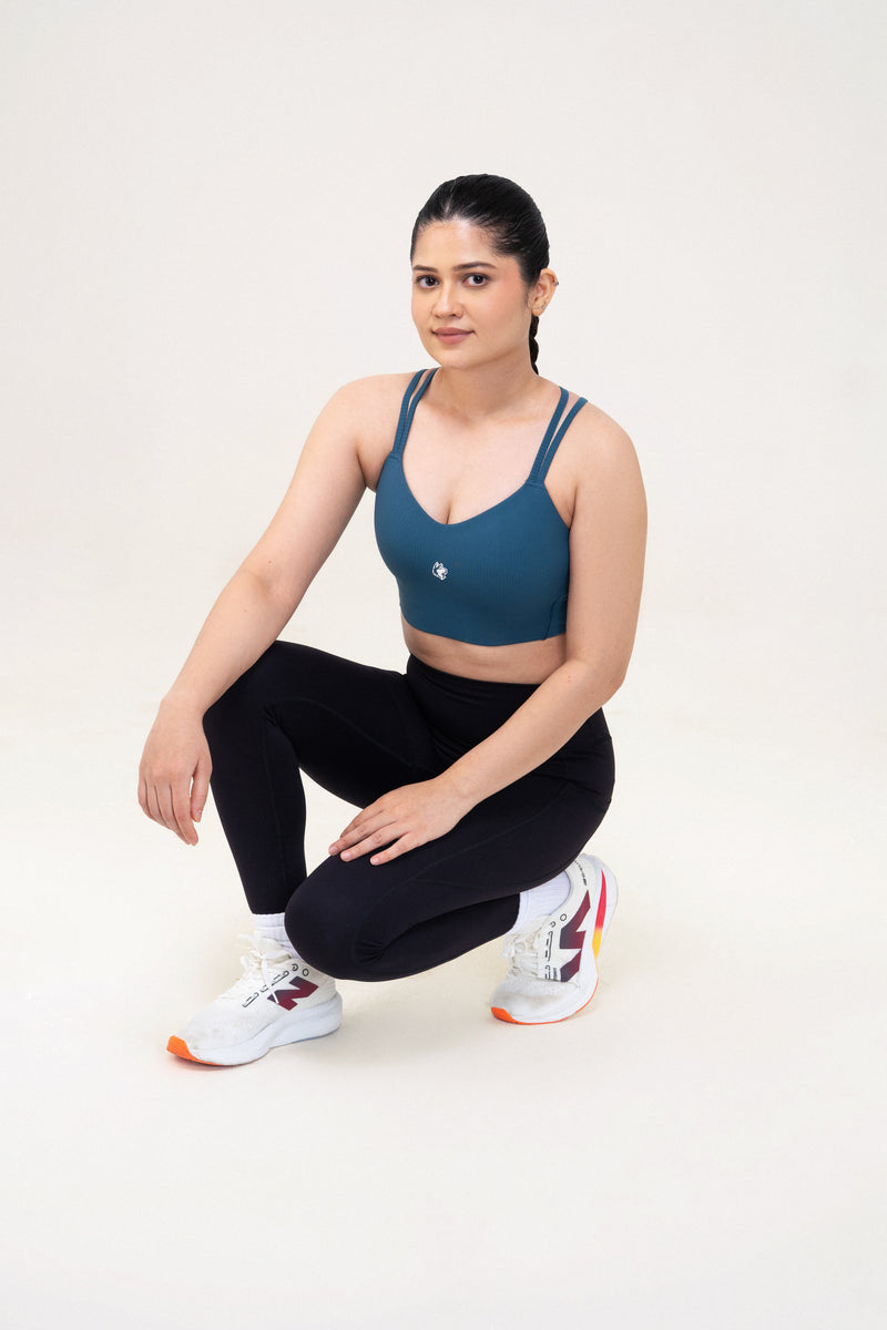 Red Husky Cross Strap Sculpt Sports Bra — Slate Blue — lifestyle — studio