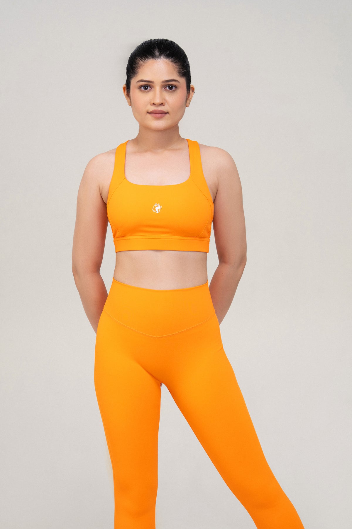 Red Husky Sculpt Sports Bra — Orange — front — studio