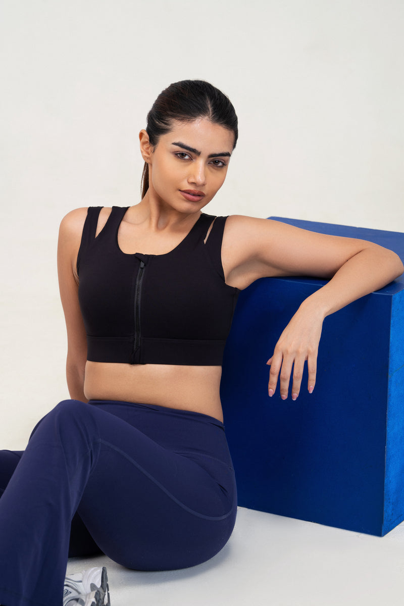 Red Husky Zip Sculpt Sports Bra — Black — lifestyle — studio
