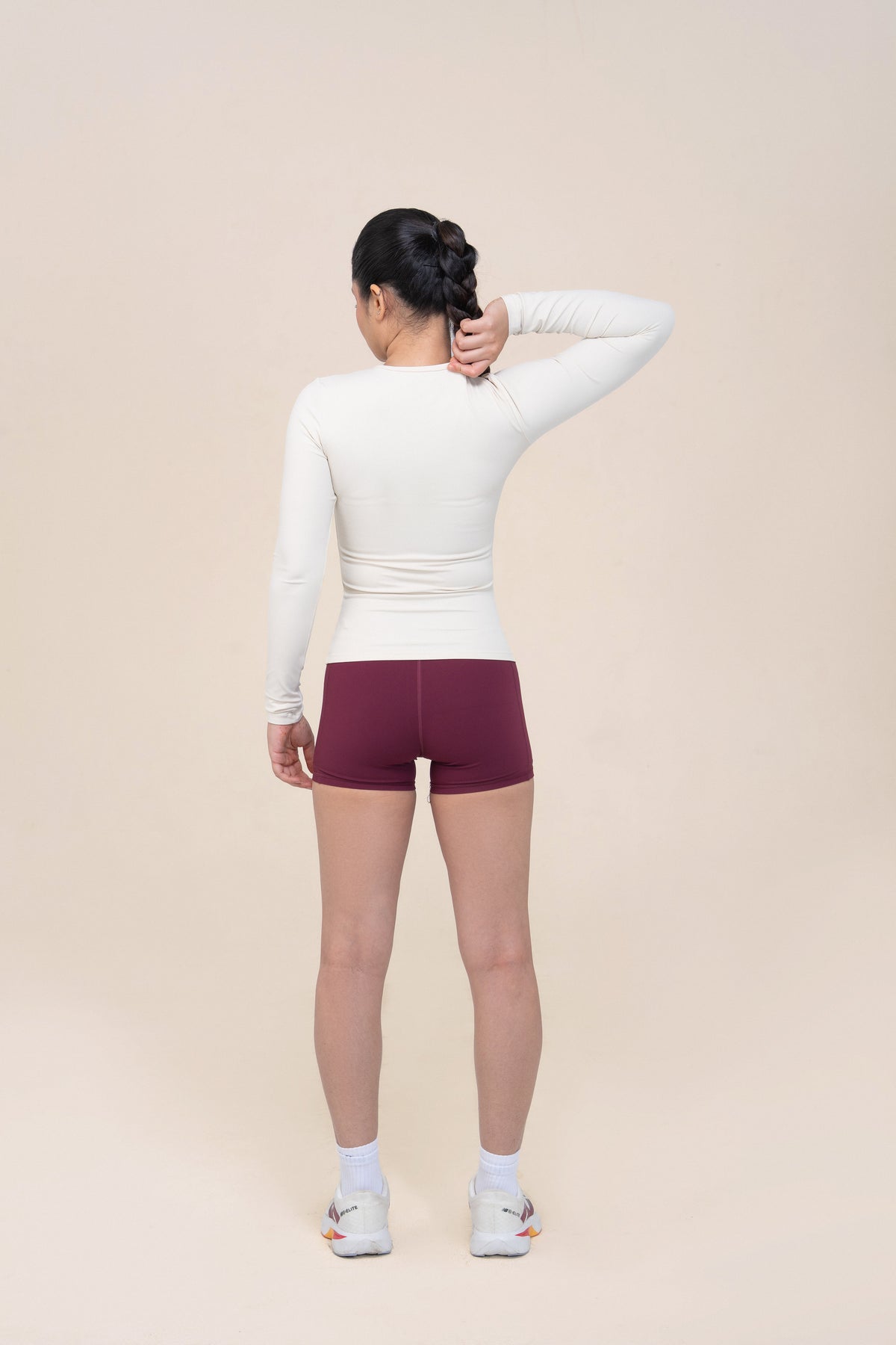 Red Husky Long Sleeve Training Top — Ivory White — back — studio
