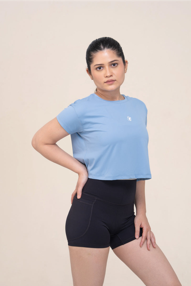 Red Husky Cropped Training Tee — Moon White Blue — side — studio
