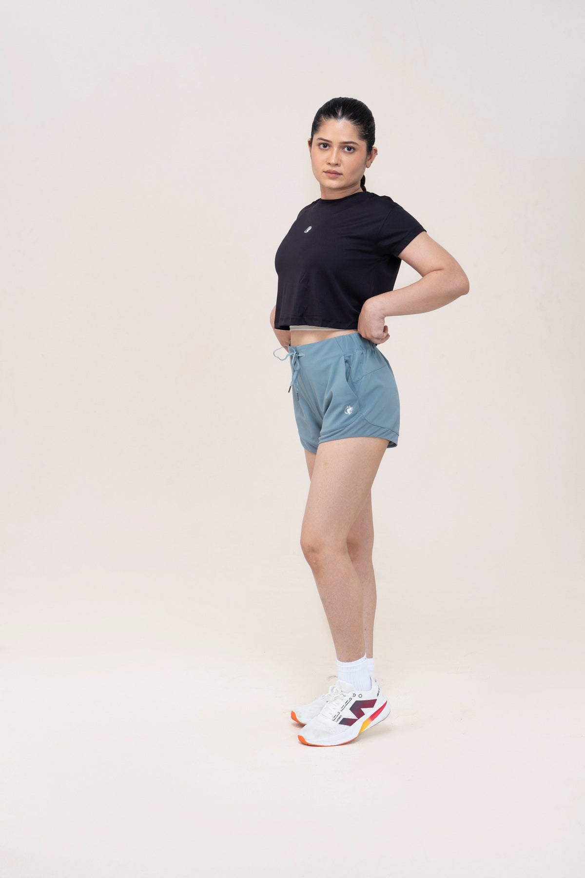 Red Husky Training Shorts — Coastal Blue — side — studio
